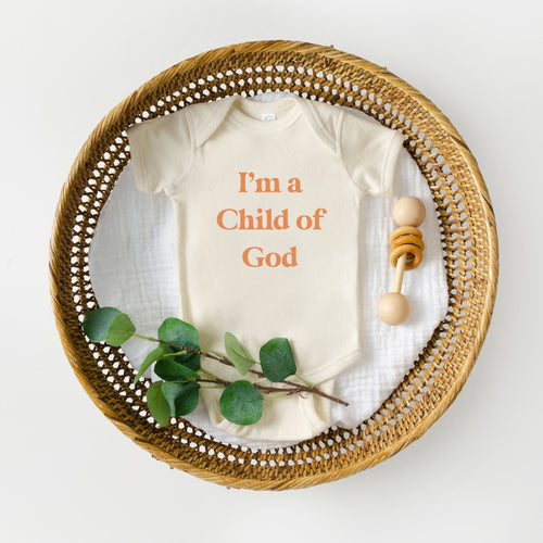 Child of God Baby Onesie - olivetreebysophie